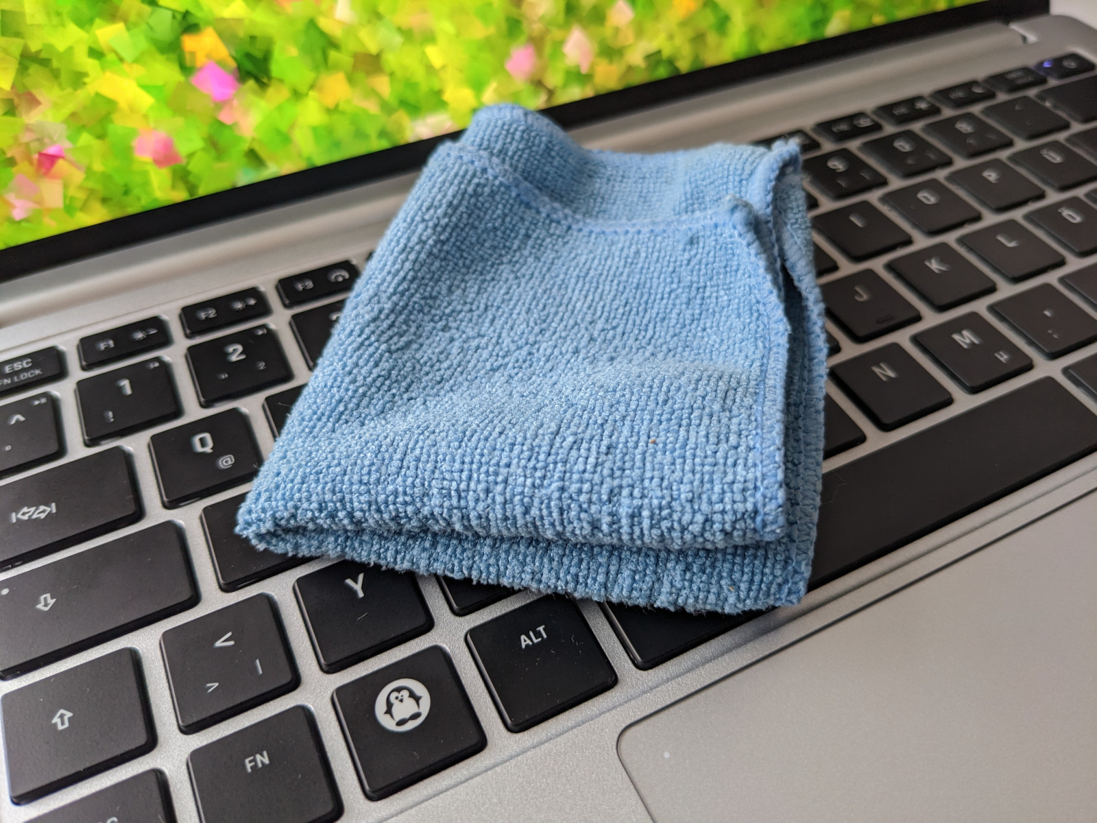 Make sure the cloth is not dripping wet, just slightly damp.
If using rubbing alcohol, ensure it is a small amount and not directly applied to the touchpad.