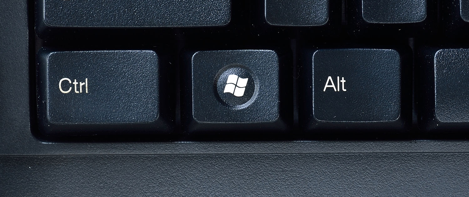 Press Alt+Tab to cycle through open windows.
Hold down the Windows key and press the arrow keys to move the window around.