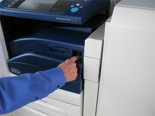 Reconnect the power cord to the back of the printer.
Press the Power button to turn on the printer.